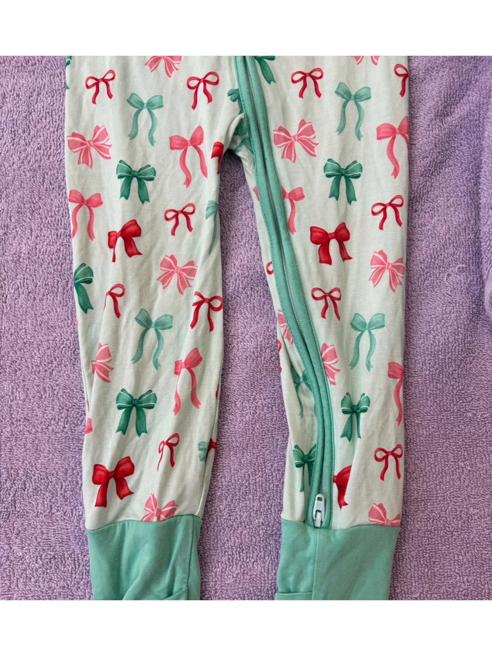 Holiday bows zip pajama